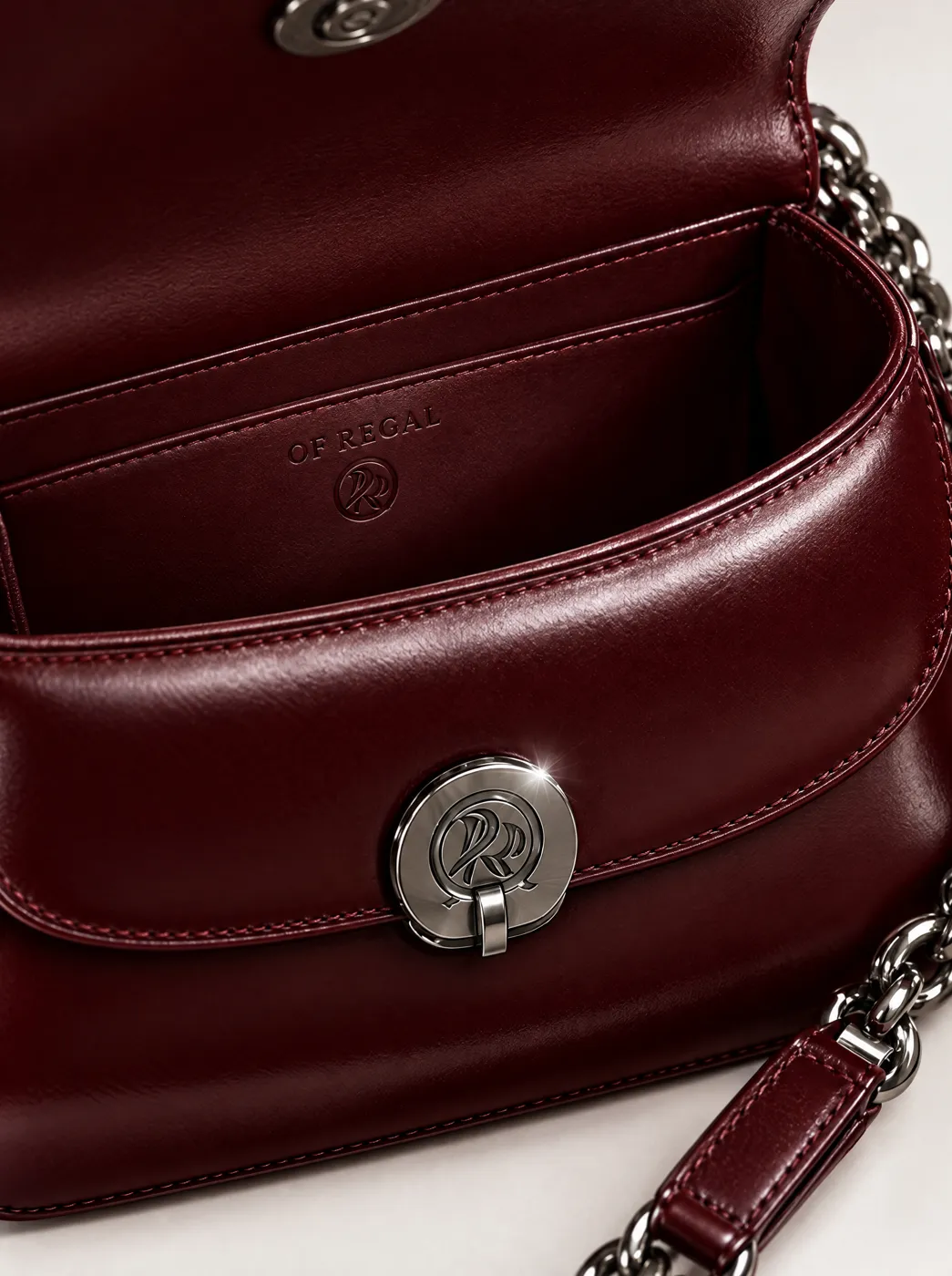 OfRegal Medallion Chain Shoulder Bag in Burgundy — detail view