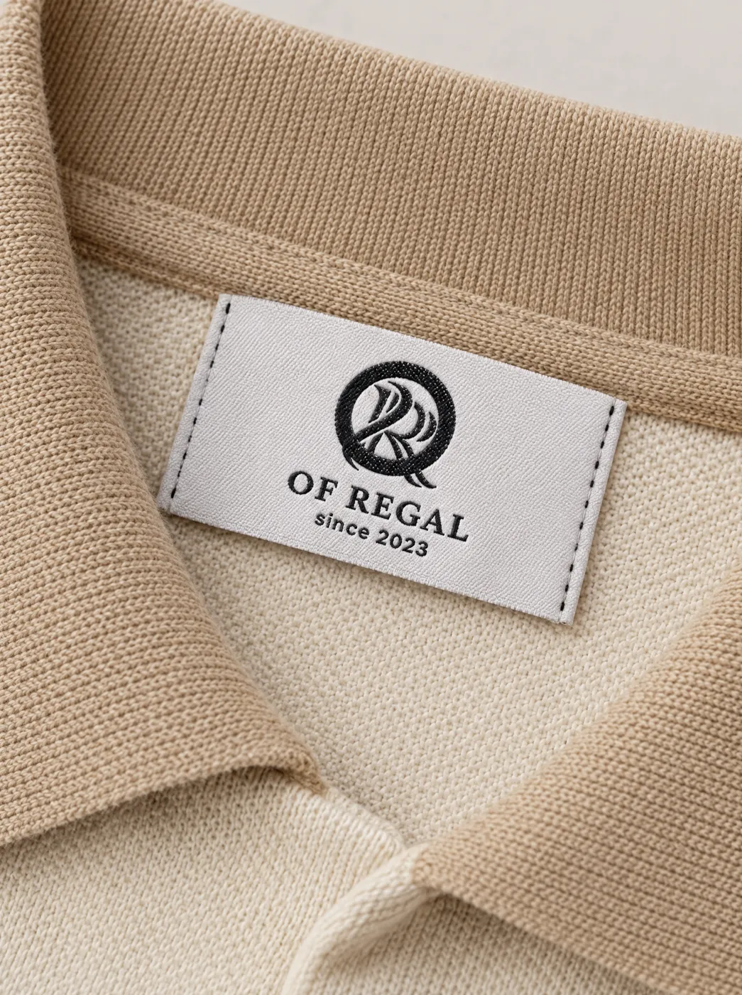 OfRegal Tiger Emblem Open-Collar Polo in Ivory Sand — detail view
